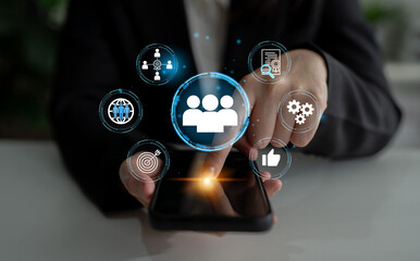 Business professional interacting with digital interface featuring user icons, social media symbols, and analytics tools illustrating technology and communication connection. Entropy.