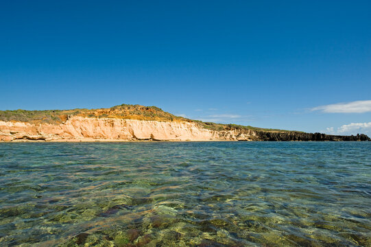 Madagascar, Ramena, Mer d'Emeraude, view of the coast from the emerald and transparent sea