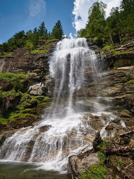 Melnikfall waterfall cascading over a rocky cliff in Maltatal, Carinthia, Austria