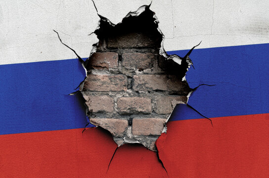 flag of Russia is painted on an old wall with cracks