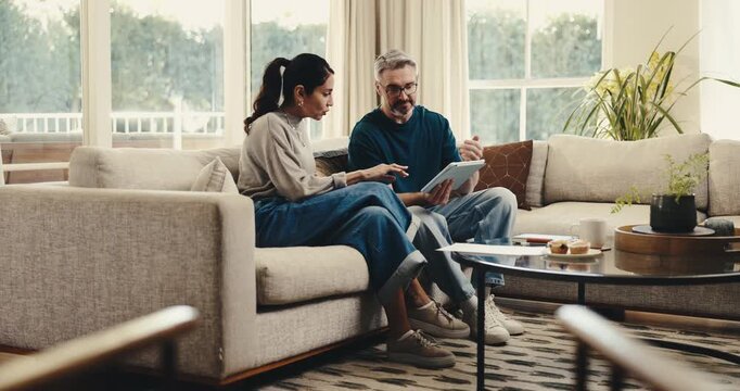 Finance, couple or talk with tablet in home for income mapping, utility bills or monthly cash flow. Marriage, mature people or happy with tech for financial summary, explain tax filing or budget plan