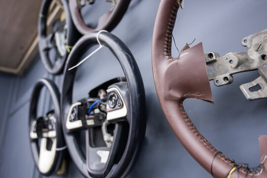 A collection of steering wheel braid samples in the workshop. 