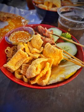 Taichan Satay with Noodles, Crackers and Fried Egg