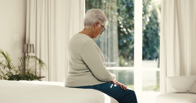 Thinking, old woman and relax at house with back, vision and calm morning for daydreaming. Senior person, rest and mindset in bedroom with reflection, nostalgia memory and remember past on retirement