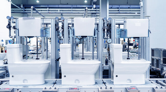 Scene of an automated production workshop for ceramic toilets in a bathroom fixture factory