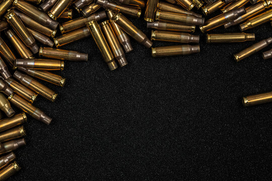 Spent ammo shell casings frame background