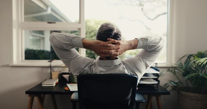 Man, relax and stretching in home office with remote work, complete finance admin task or finish job. Back, contractor and male person done with financial audit, bookkeeping and rest by house window.