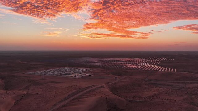 Aerial View of Utility-Scale Solar Farm with Battery Energy Storage System in Arid Desert