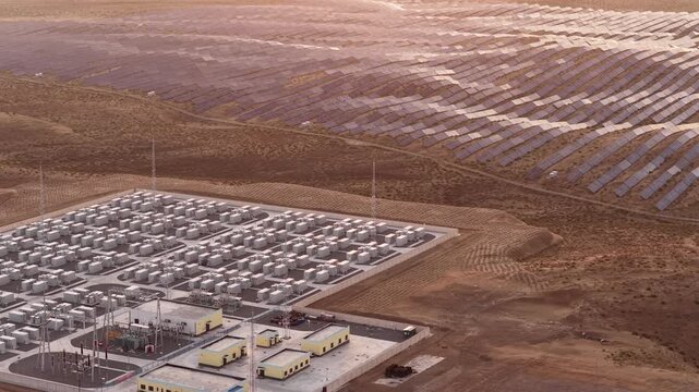Aerial View of Utility-Scale Solar Farm with Battery Energy Storage System in Arid Desert