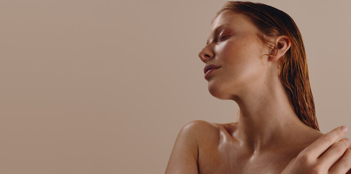 Woman portrait with glowing skin for skincare and beauty
