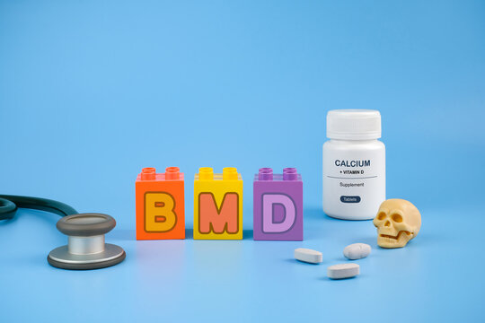 Bone Mineral Density BMD Concept with Calcium Vitamin D and Skull