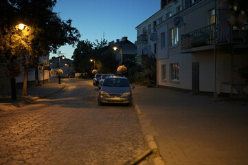 Fototapeta premium Street in the Old Town evening streetlight glow