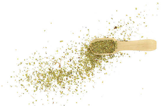 Chopped dry thyme in wooden spoon, isolated on white background and texture, top view