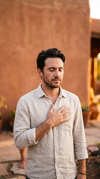 Man Practicing Somatic Grounding Breathwork and Mindfulness for Anxiety Relief