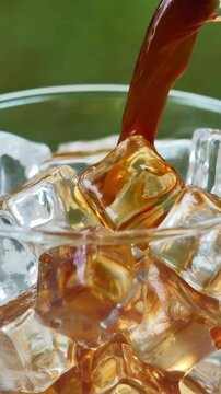 Pouring Iced Americano Coffee into Glass