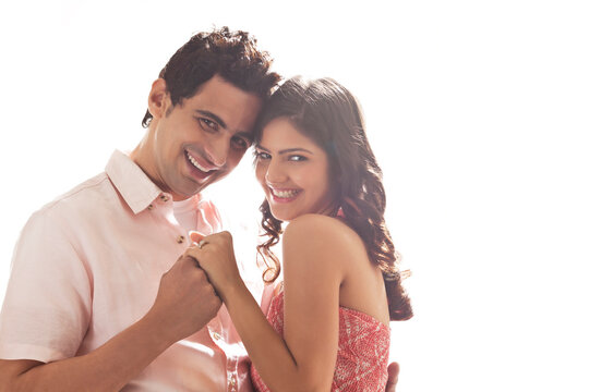 Portrait of couple holding each other