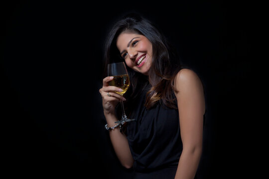 Woman with a glass of wine enjoying herself
