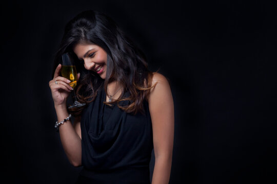 Woman with a glass of wine enjoying herself