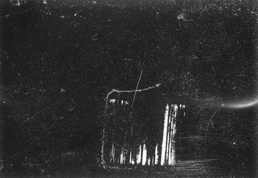 Blank grained film strip texture background with heavy grain, dust and light leak