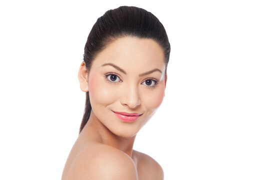 Close-up of a pretty young woman over white background 