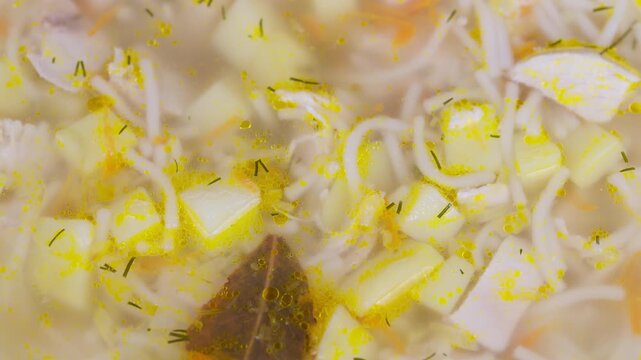 Fresh herbal noodle. Savory homemade soup with herbs. Warm bowl of handcrafted noodle broth with herbs. Comforting homemade noodle soup garnished with shredded eggs and dill