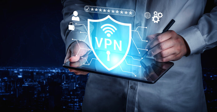 User Interacting with Virtual Private Network Concept on Tablet in Cybersecurity Environment with Visual Data Network Graphics Haptic.