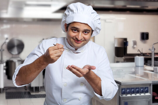 Chef tasting his cooking 