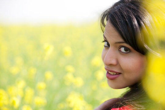 Portrait of a woman in a field 
