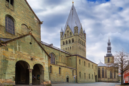 St Patroclus Cathedral and St Peters Church in Soest, Germany, cityscape view. Historic medieval architecture under cloudy winter sky