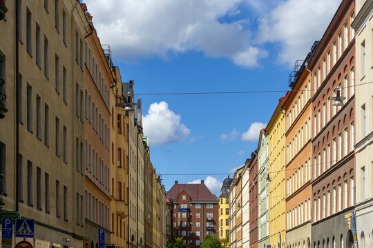 Vasastan Stockholm street with colorful buildings and blue sky