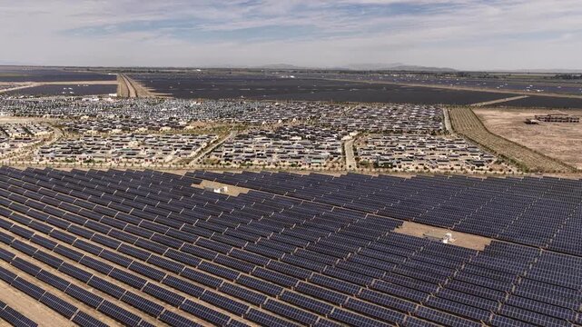 Aerial View of Utility-Scale Solar Farm with Battery Energy Storage System in Arid Desert