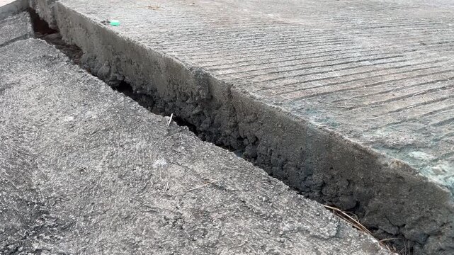 Separated Concrete Road Joint with Wide Gap on Damaged Infrastructure