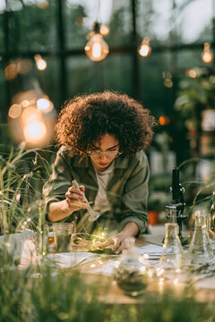 Diverse Female Scientist Testing Soil Samples Authentic Research Green Tech Realism Ecology Laboratory