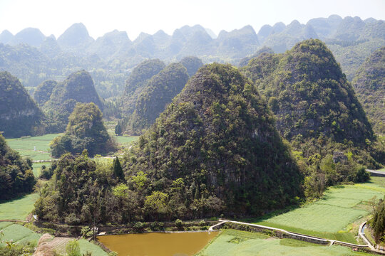 Wanfenglin (Forest of Ten Thousand Peaks) is a breathtaking national park in Xingyi, Guizhou, China. It features one of the world's most stunning karst landscapes, with nearly 20,000 cone-shaped
