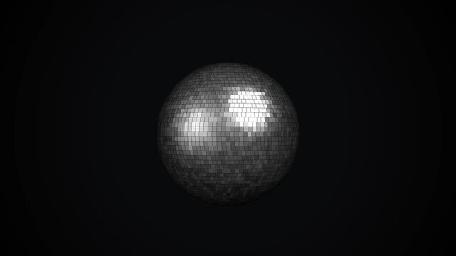 Rotating disco ball with sparkling reflections for a festive nightlife party background.