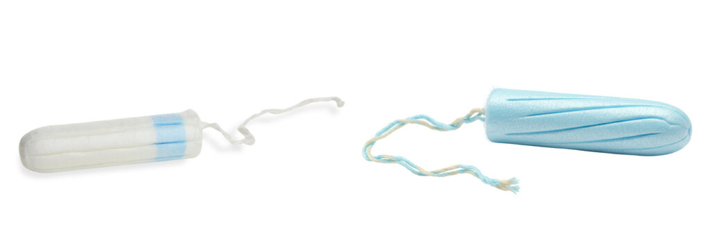 Two tampons with strings, one white with blue stripes and one light blue, isolated on a white background