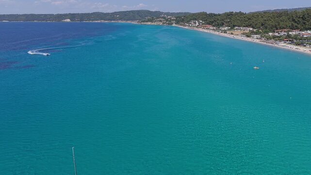 Turquoise Possidi beach coastline and clear Aegean waters