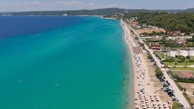 Possidi beach stretching along turquoise Aegean Sea waters