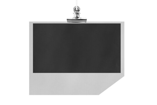 Blank photo frame hanging on a rope with a metal clip clothespin. Isolated transparent PNG mockup.