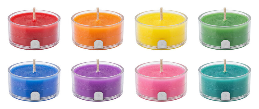 Colorful tealight candles set isolated on black background, rainbow wax tea lights arrangement in clear plastic holders for aromatherapy, spa relaxation, ambient lighting decor, holiday celebration.