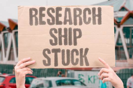 "Research Ship Stuck" The ice closes in like a fist, and the scientists wait for a break in the white. ARCTIC ICE MELT. SHIP ENTANGLEMENT. ICE ENCLOSURE. RESEARCH DELAY. LOGISTICAL HAZARD.