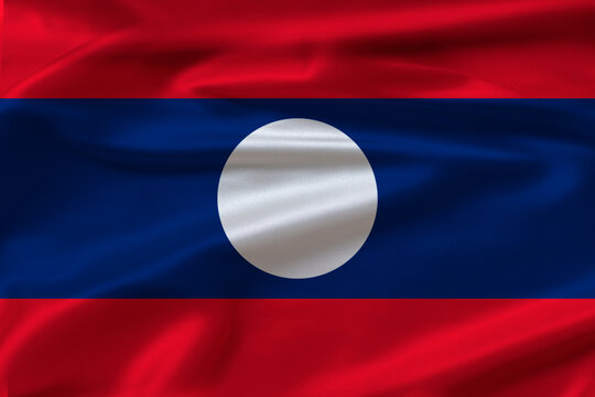 Close up of flag of Laos with cloth texture. Laos flag with fabric texture waving