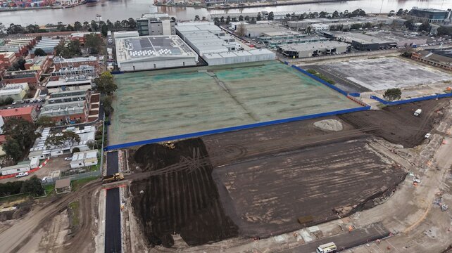 Aerial view developing industrial construction site infrastructure earthworks