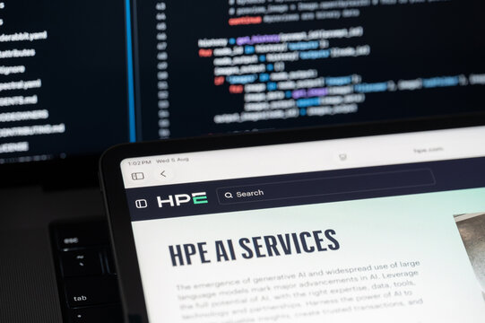 HPE Ai company web page on program code background