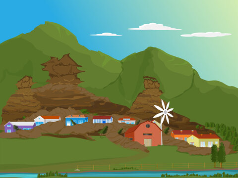 Houses and trees buried under mud and debris as a result of a landslide.