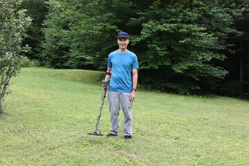 Fototapeta premium man with metal detector 