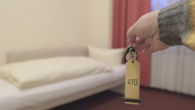 keys in female hand, hotel bedroom with neatly made bed covered in clean white linens, room rental, comfort and relaxation, Hotel Service and Hospitality, Tourism and Travel, restful night's sleep