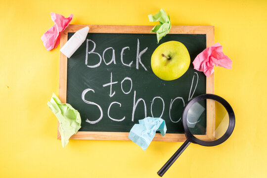 Back to School. School equipment high-colored bright flat lay