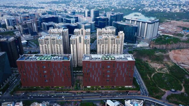 The skyview twin towers building with my home bhooja and background Sattva Knowledge city at raidurgam, madhapur, hyderabad, telangana, india. day time, trucking shot, drone shot, 4k.