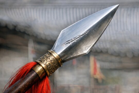 A close-up shot of someone holding a sword, perfect for fantasy or adventure-themed illustrations